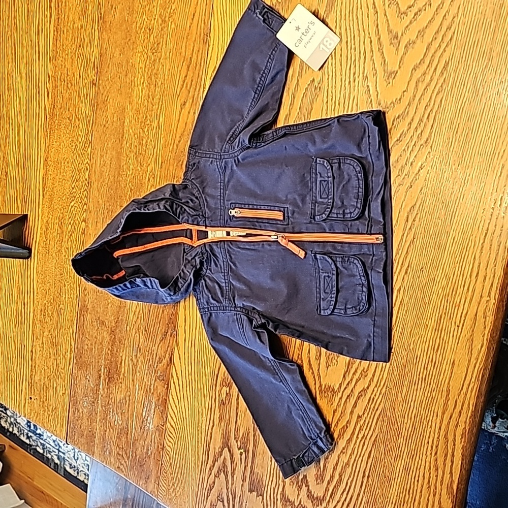 NWT Carter's navy blue w/ orange zip. Size 18 months.